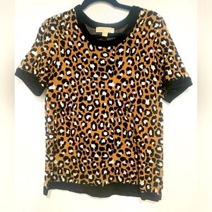 Michael Kors short sleeve leopard sweater. Stretchy, thick material. Never worn.